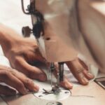 Sewing Skills - Person Holding Sewing Machine