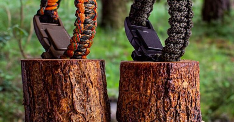 Paracord Bracelet - Two Survival Bracelets on Tree Stumps in the Forest