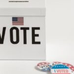 Merit Badges - White Ballot Box on the Table