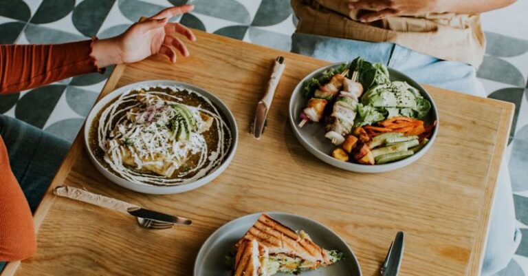 Dehydrated Meals - Two people sitting at a table with food and drinks