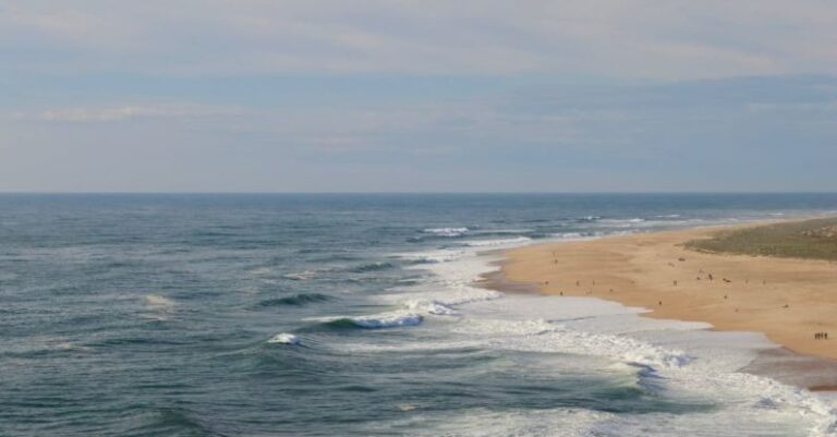 Lashing - Sea Waves Gently Lashing against Sandy Beach