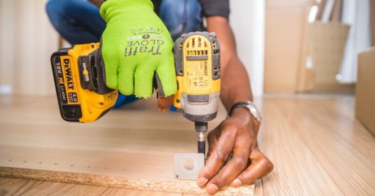 Woodworking Projects - Person Using Dewalt Cordless Impact Driver on Brown Board