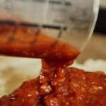 Food Handling - Clear Glass Jar Pouring Red Sauce Pizza Crust
