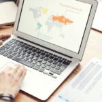 International Projects - Photo Of Person Using Laptop