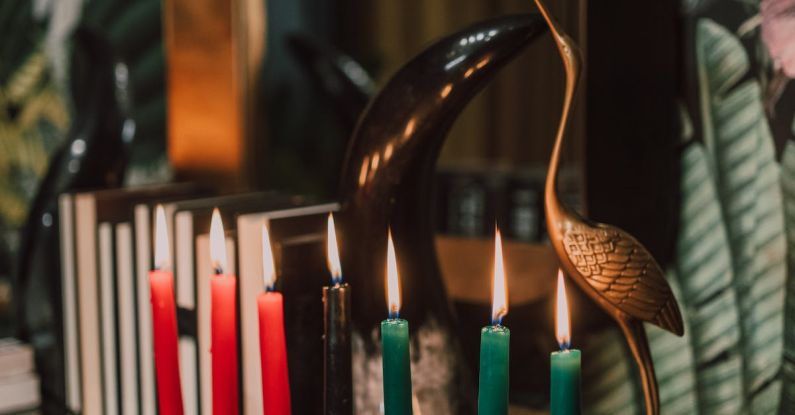 Principles - Lighted Candles on Glass Surface