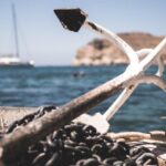 Anchor - White and Black Anchor With Chain at Daytime