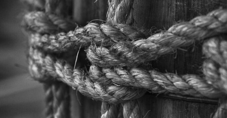 Knot - Grayscale Photo of Rope on Log