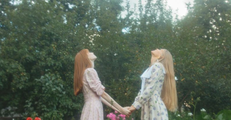 Wild Plants - Women Standing Grass Looking Up at the Sky